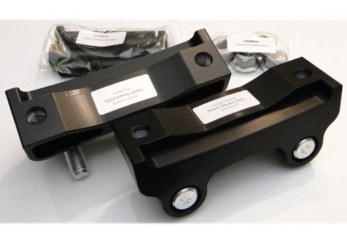 Brake caliper adapter for Nissan Navara D22